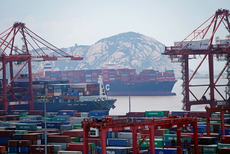 Containers are seen at the Yangshan Deep Water Port in Shanghai