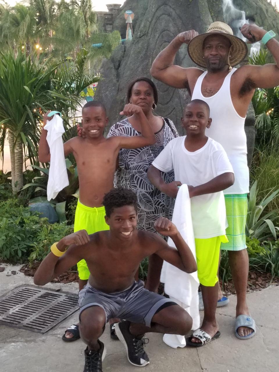Gifford resident Toshuua Hughes, her husband Rodrick Phinizee, on right, and three of their five children, before she suffered an anoxic brain injury following hysterectomy surgery June 16, 2017 at Indian River Medical Center, in Vero Beach.