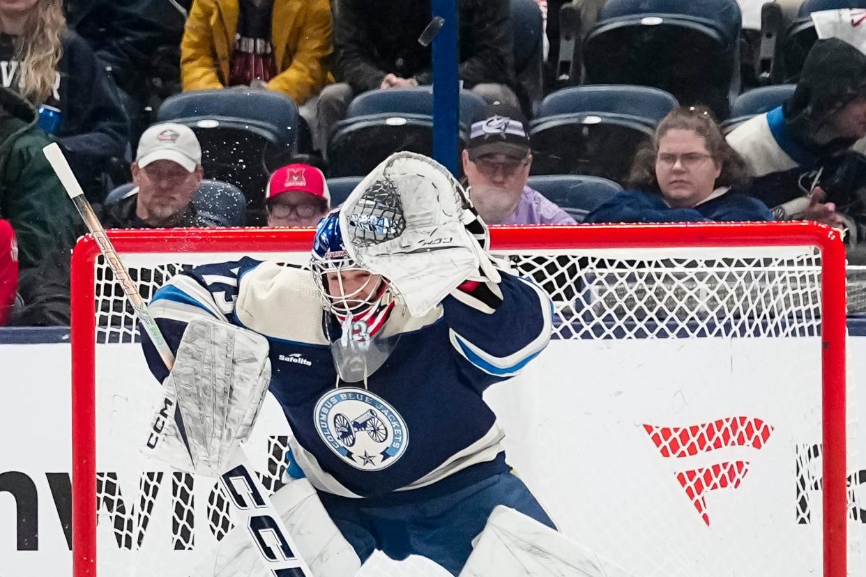 Apr 4, 2024; Columbus, Ohio, USA; Columbus Blue Jackets goaltender Jet Greaves (73) makes a save during the third period of the NHL hockey game against the New York Islanders at Nationwide Arena. The Blue Jackets lost 4-2.