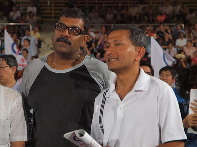 Minister for the environment and water resources, Vivian Balakrishnan, stood in the crowd watching on Thursday night at Hougang stadium. (Yahoo! Singapore/ Alvin Ho)