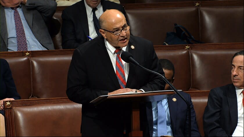 Rep. Lou Correa, D-Calif., speaks as the House of Representatives debates the articles of impeachment against President Donald Trump at the Capitol in Washington, Wednesday, Dec. 18, 2019. (House Television via AP)