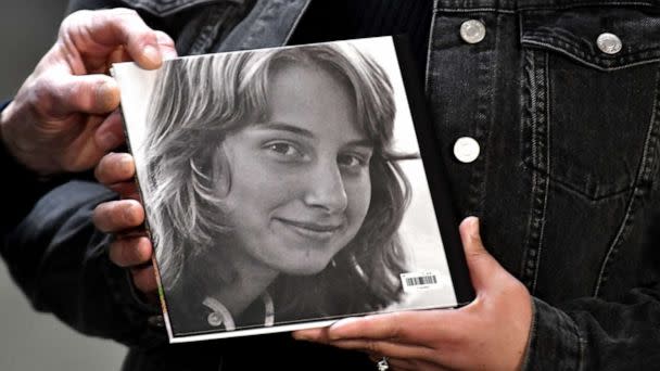 PHOTO: Larry Griffin, brother of the late Julie Jensen, holds a book showing Julie Jensen while they speak to the media as the jury deliberates in Mark Jensen's trail at Kenosha County Courthouse on Jan. 31, 2023, in Kenosha, Wis. (Sean Krajacic/The Kenosha News via AP, Pool)