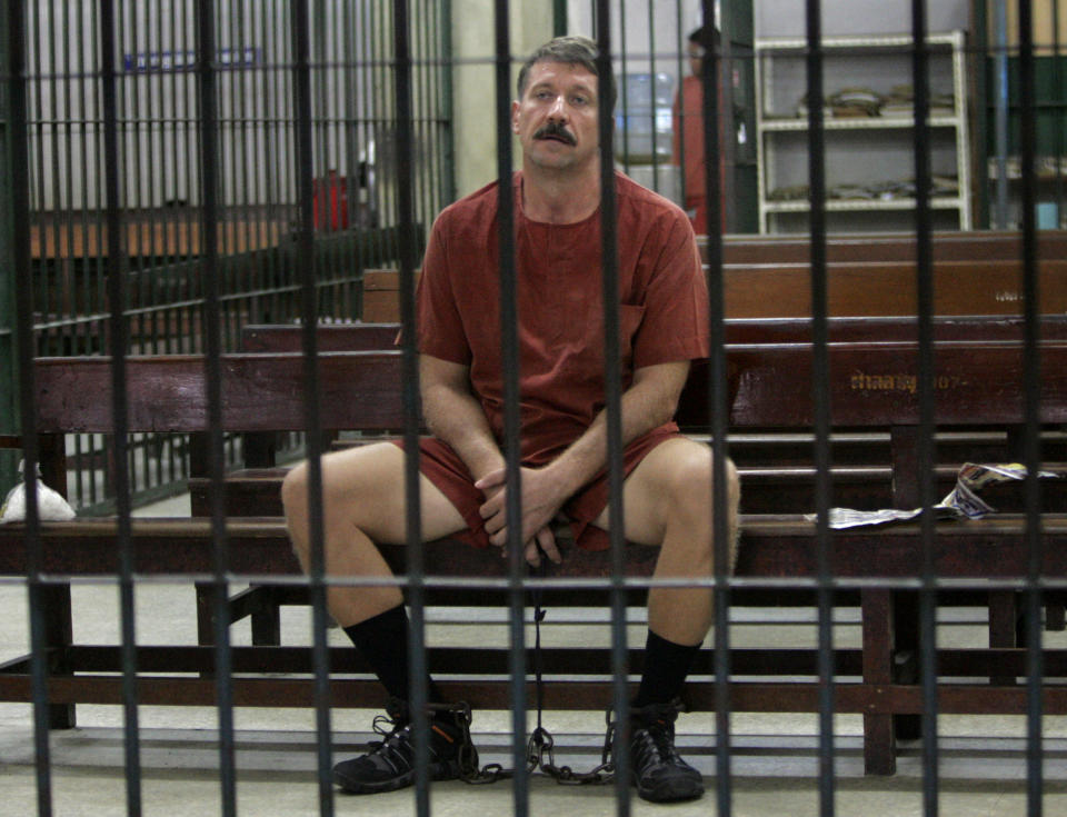 FILE - Viktor Bout sits while waiting for his verdict at the detention room at a criminal court in Bangkok, Thailand, Tuesday, Aug. 11, 2009. The Russian arms dealer who once inspired a Hollywood movie is back in the headlines with speculation around a return to Moscow in a prisoner exchange for U.S. WBNA star Brittney Griner and former U.S. Marine Paul Whelan. (AP Photo/Apichart Weerawong)