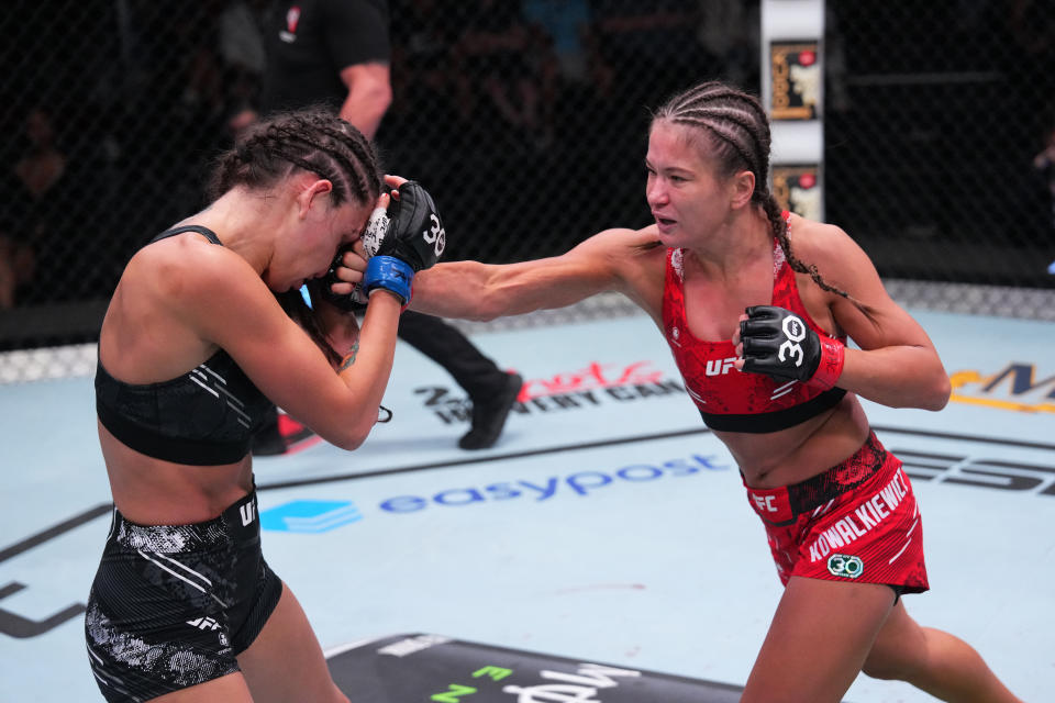 LAS VEGAS, NEVADA – OCTOBER 07: (R-L) Karolina Kowalkiewicz of Poland punches Diana Belbita of Romania in a strawweight fight during the UFC Fight Night weigh-in at UFC APEX on October 07, 2023 in Las Vegas, Nevada. (Photo by Al Powers/Zuffa LLC via Getty Images)