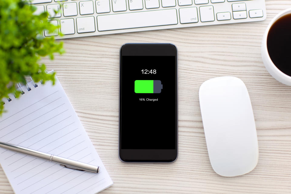 Shutterstock image showing a smartphone wirelessly charging