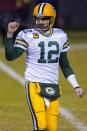 Green Bay Packers' Aaron Rodgers reacts during the second half of an NFL football game against the Chicago Bears Sunday, Jan. 3, 2021, in Chicago. (AP Photo/Charles Rex Arbogast)