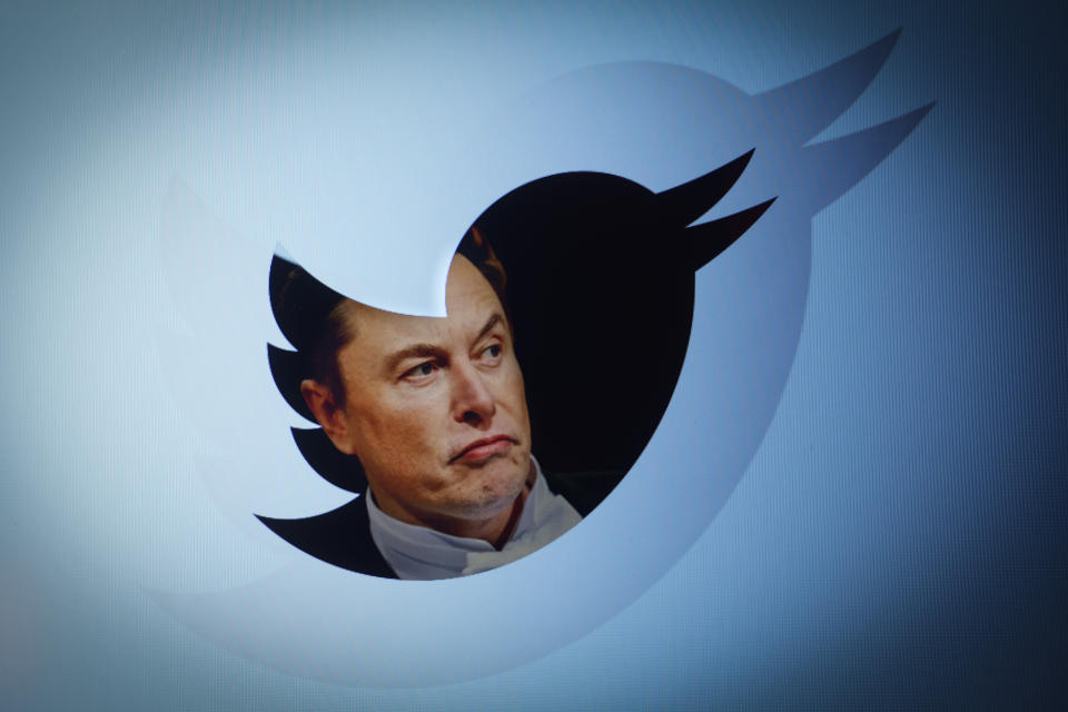 Twitter owner Elon Musk is seen with a Twitter logo in this photo illustration in Warsaw, Poland on 21 September, 2022. Twitter management has announced the introduction of a new verification label to replace the blue check previously given only to verified accounts. As the director of the service, Esther Crawford explains, unlike the blue symbol this one will be gray and it will be free. Twitter management has announced the introduction of a new verification label to replace the blue check previously given only to verified accounts. As the director of the service, Esther Crawford explains, unlike the blue symbol this one will be gray and it will be free. Verified accounts will now have an 'Official' badge under their username, along with a gray verification tag. All previously verified accounts will receive the 'official' check mark which will not be available for purchase and not everyone will be eligible. (Photo by STR/NurPhoto via Getty Images)