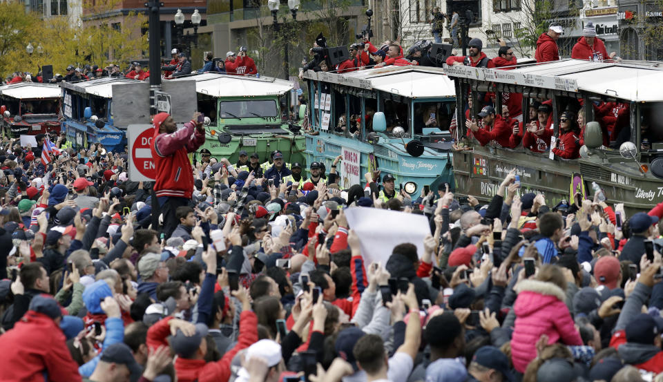 Some Red Sox fans decided to throw beer fans during the team’s World Series parade. (AP Photo)