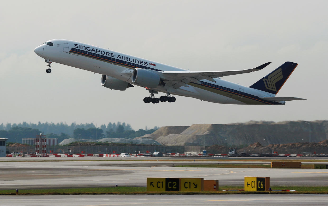 A Singapore Airlines plane takes off at Changi Airport. (PHOTO: Reuters)