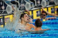 Jul 1, 2016; Omaha, NE, USA; Ryan Murphy (right) and Jacob Pebley react after the men's 200 meter backstroke final in the U.S. Olympic swimming team trials at CenturyLink Center. Mandatory Credit: Rob Schumacher-USA TODAY Sports