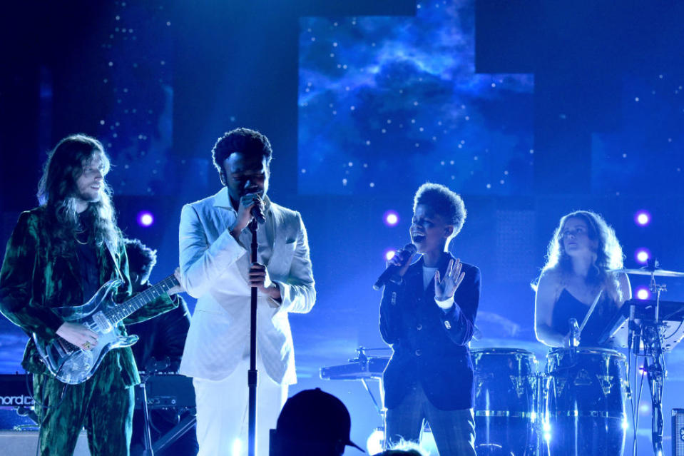 <p>Childish Gambino (at the microphone) and J.D. McCrary (to his right) perform onstage during the 60th Annual Grammy Awards at Madison Square Garden on January 28, 2018, in New York City. (Photo: Getty Images) </p>