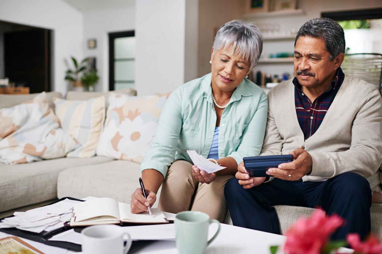 Senior couple doing finances at home