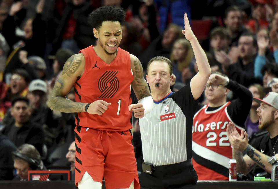 Portland Trail Blazers guard Anfernee Simons reacts after hitting a shot during overtime of an NBA basketball game against the Toronto Raptors in Portland, Ore., Saturday, March 9, 2024. (AP Photo/Steve Dykes)