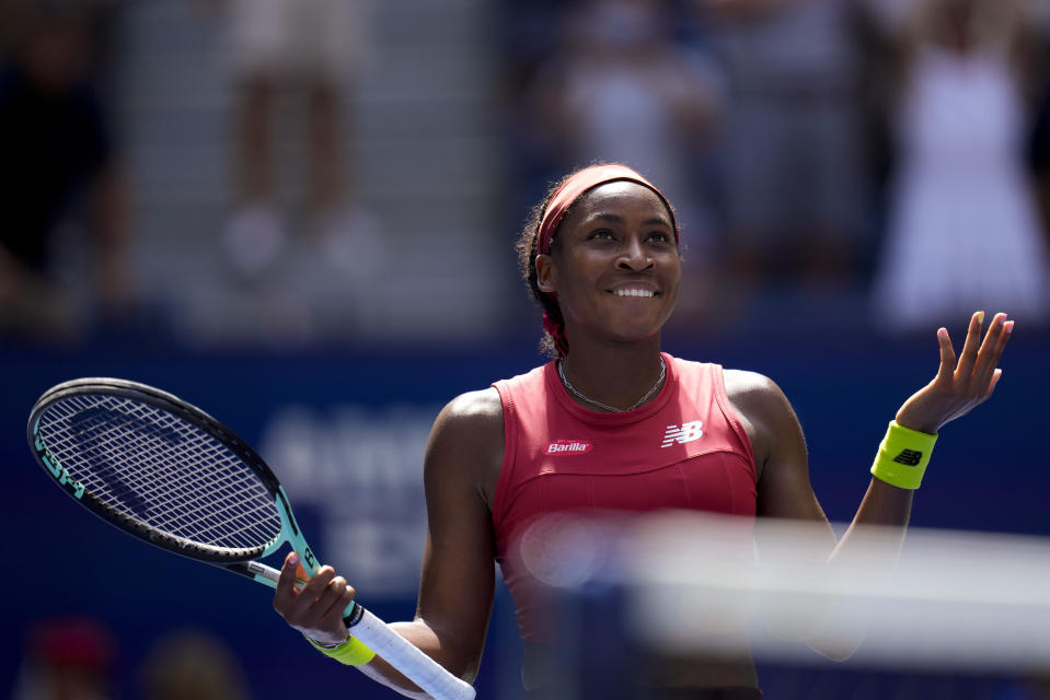 Coco Gauff, of the United States, reacts to the crowd after defeating Jelena Ostapenko, of Latvia, during the quarterfinals of the U.S. Open tennis championships, Tuesday, Sept. 5, 2023, in New York. (AP Photo/Manu Fernandez)