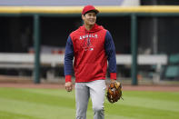 Los Angeles Angels' Shohei Ohtani heads back to the clubhouse before a baseball game against the Chicago White Sox Monday, May 2, 2022, in Chicago. (AP Photo/Charles Rex Arbogast)