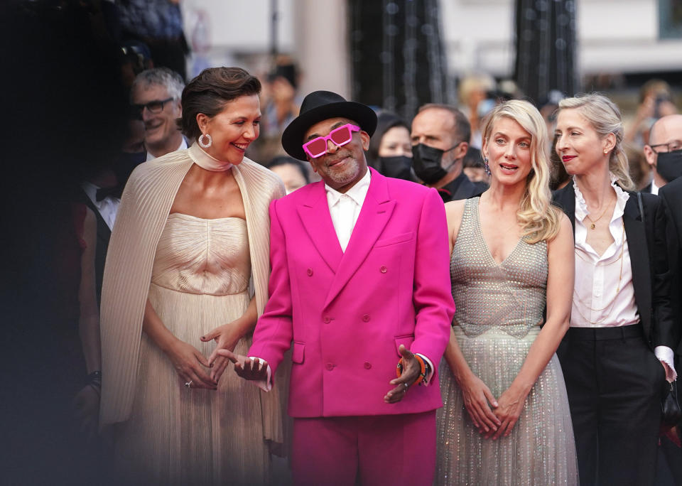 FILE - In this July 6, 2021 file photo Jury president Spike Lee, second from left, poses with jury members Maggie Gyllenhaal, from left, Melanie Laurent and Jessica Hausner at the premiere of the film 'Annette' and the opening ceremony of the 74th international film festival, Cannes, southern France, Tuesday, July 6, 2021. (AP Photo/Brynn Anderson, File)