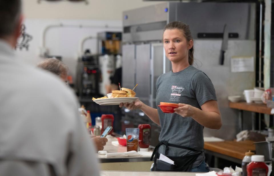 Katie Wallace, a server at the Coffee Cup restaurant in downtown Pensacola will get a bump in pay as Florida increases its minimum wage and the minimum pay for tip-based workers.