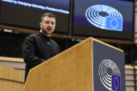 Ukraine's President Volodymyr Zelenskyy speaks during an EU summit at the European Parliament in Brussels, Belgium, Thursday, Feb. 9, 2023. On Thursday, Zelenskyy will join EU leaders at a summit in Brussels, which German Chancellor Olaf Scholz described as a "signal of European solidarity and community." (AP Photo/Olivier Matthys)