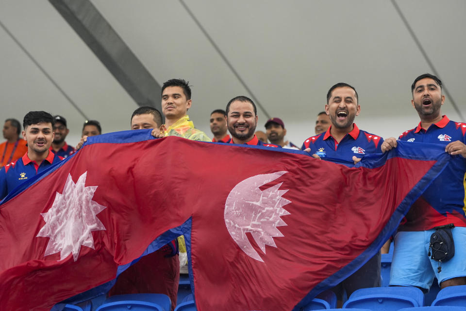 Nepal supporters react ahead of the men's T20 World Cup cricket match between Sri Lanka and Nepal at Central Broward Regional Park Stadium, Lauderhill, Florida, Tuesday, June 11, 2024. (AP Photo/Lynne Sladky)