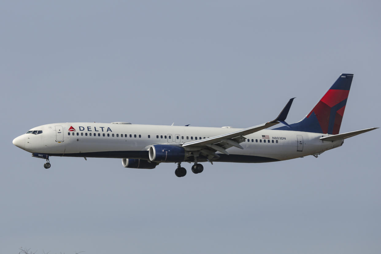 NEW YORK, UNITED STATES - 2020/10/19: A Delta Air Lines Boeing 737 passenger jet aircraft landing at New York JFK John F. Kennedy International Airport in NY, USA. The airplane is a narrowbody Boeing 737-900ER with registration N803DN. (Photo by Nik Oiko/SOPA Images/LightRocket via Getty Images)
