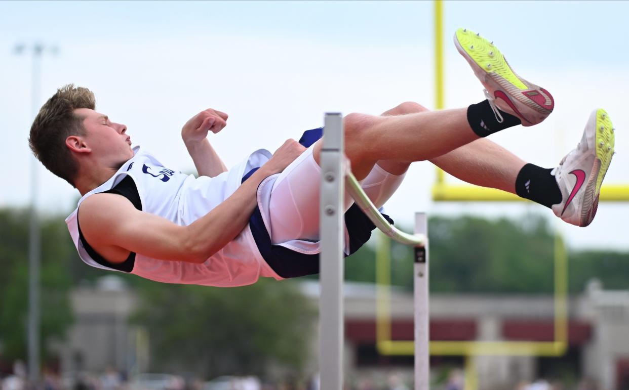 Bloomington South’s Andrew Elsesser clears 6-3 to win the boys' high jump during the track meet at North on Wednesday, May 1, 2024.
