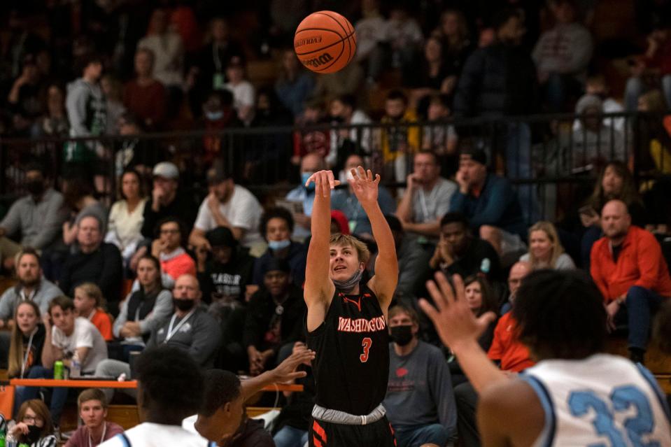 Washington High's Jake Stewart shoots the ball during a match against Kankakee in the Kevin Brown Memorial Tournament of Champions on Wednesday, Nov. 24, 2021. The Panthers beat the Kays 51-34.