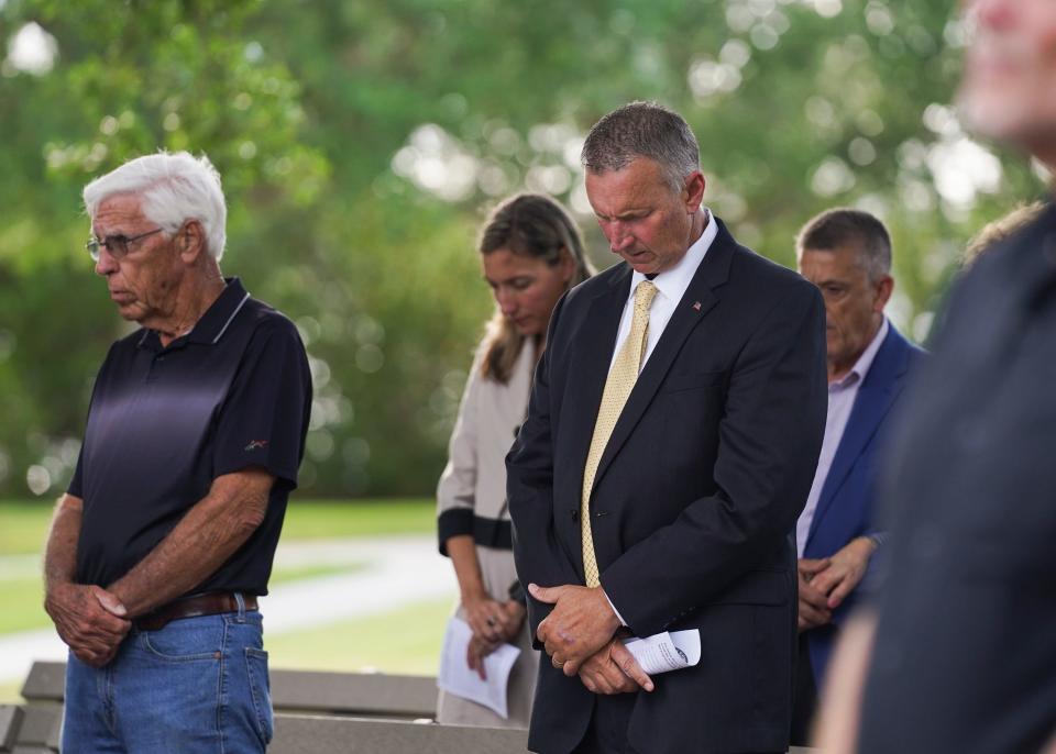 "Let us honor the loved ones that have been lost but more importantly lets recommit ourselves to the rights and remembrance of victims," said State Attorney Tom Bakkedahl, who prays during the annual Victims' Rights Vigil on Thursday, April 28, 2022, at Veteran's Memorial Island in Vero Beach. The service was hosted by the Indian River County Victims' Rights Coalition and is part of National Crime Victims' Rights Week.