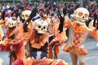 <p>People are seen participate during the traditional Skulls Parade as part of Day of the Dead celebrations at Reforma Avenue on Oct. 28, 2017 in Mexico City, Mexico. (Photo: Carlos Tischler/NurPhoto via Getty Images) </p>