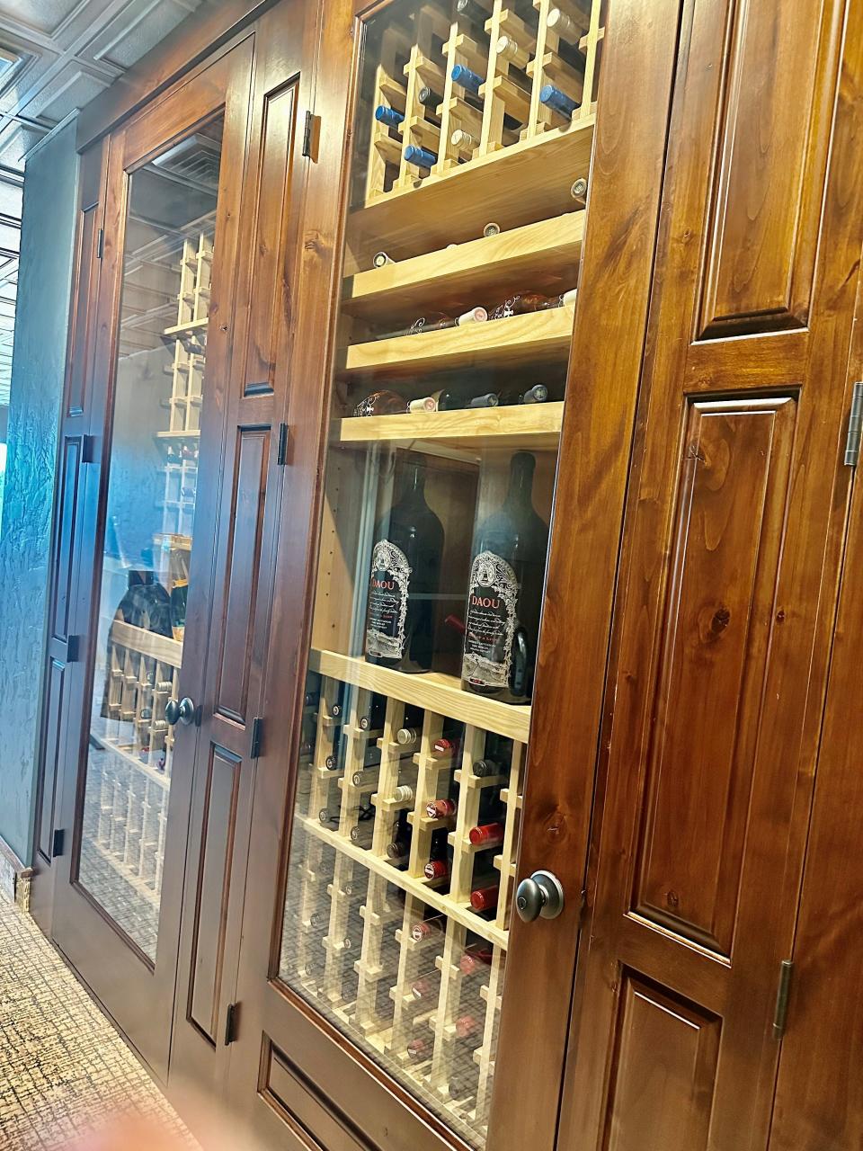 The wine cabinet from Emilio's Prime Steakhouse. The cabinet holds over 300 different types of wine.