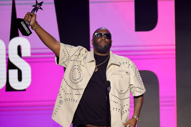 <p>Kevin Winter/Getty</p> Killer Mike accepts the award for "Album of the Year" onstage during the 2024 BET Awards at Peacock Theater on June 30, 2024 in Los Angeles