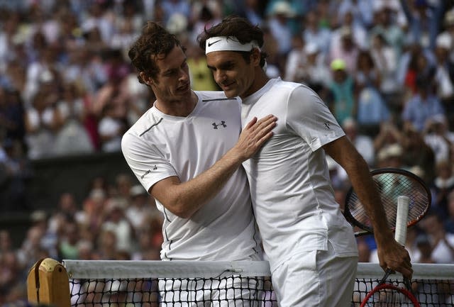 Andy Murray, left, congratulates Roger Federer at Wimbledon in 2015