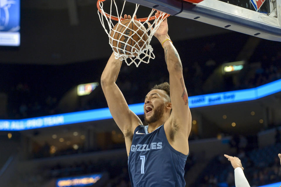 Memphis Grizzlies forward Kyle Anderson (1) dunks the ball in the first half of an NBA basketball game against the Minnesota Timberwolves Thursday, Jan. 13, 2022, in Memphis, Tenn. (AP Photo/Brandon Dill)