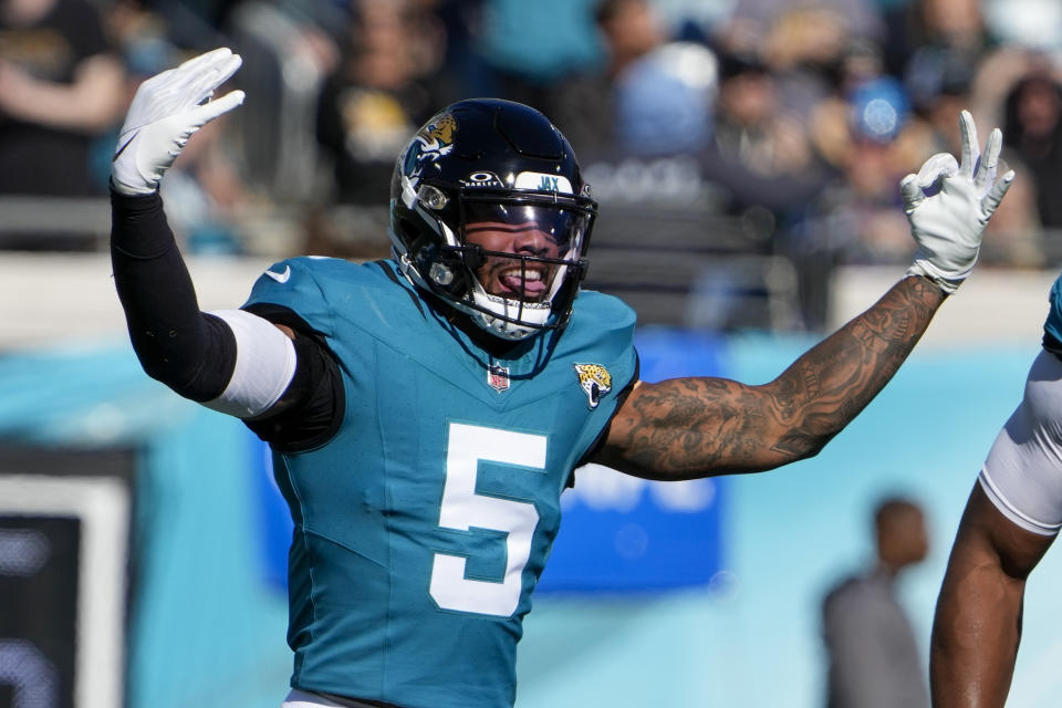 Jacksonville Jaguars safety Andre Cisco celebrates after sacking Carolina Panthers quarterback Bryce Young during the first half of an NFL football game Sunday, Dec. 31, 2023, in Jacksonville, Fla. (AP Photo/John Raoux)