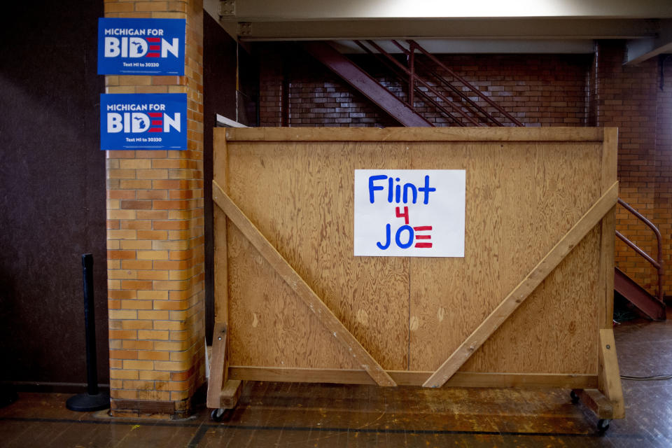 Signs in support of former Vice President Joe Biden are taped to the walls at Berston Field House after his campaign stop on Monday, March 9, 2020 in Flint. Biden is a candidate for the Democratic nomination for president. (Jake May/The Flint Journal via AP)