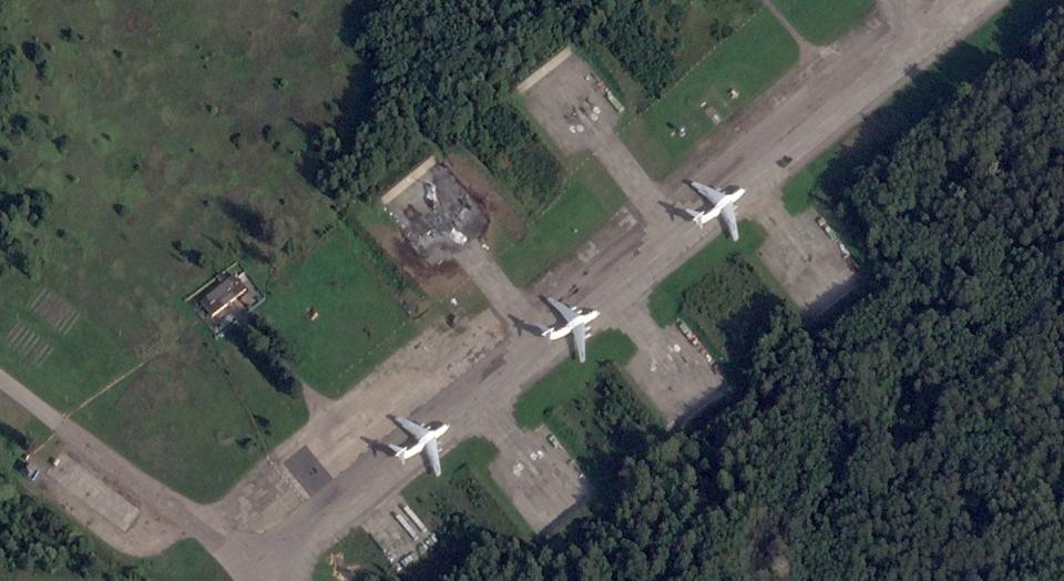 A Russian IL-76 Candid transport jet seen destroyed during a Ukrainian drone attack on Kresty Air Base in Pskov, Russia. <em>PHOTO © 2023 PLANET LABS INC. ALL RIGHTS RESERVED. REPRINTED BY PERMISSION</em>