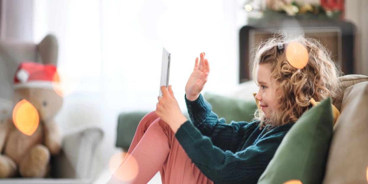 Girl on ipad at Christmas