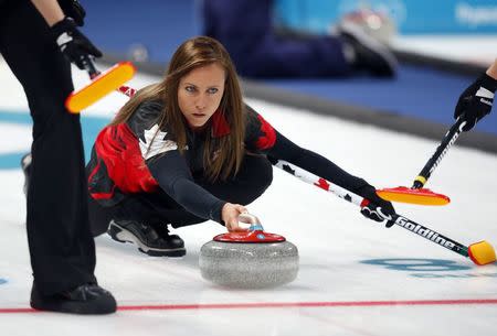 Curling - Pyeongchang 2018 Winter Olympics - Women's Round Robin - Britain v Canada - Gangneung Curling Center - Gangneung, South Korea - February 21, 2018 - Skip Rachel Homan of Canada delivers a stone. REUTERS/Phil Noble