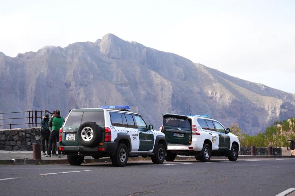 Members of the Guardia Civil near the village of Masca, Tenerife, on Saturday (PA Wire)