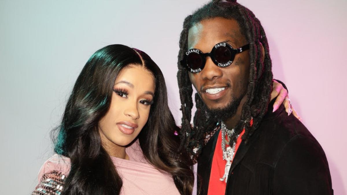 Cardi B Reveals Her Baby Bump In Gold Breastplate In 'Rumors