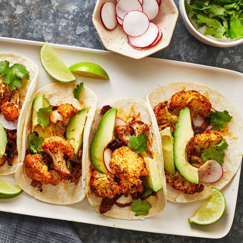 <p>These easy vegan cauliflower tacos with chili powder, red onion and creamy avocado garnish are perfect for taco night. <a href="https://www.eatingwell.com/recipe/7888906/easy-cauliflower-tacos/" rel="nofollow noopener" target="_blank" data-ylk="slk:View Recipe;elm:context_link;itc:0;sec:content-canvas" class="link ">View Recipe</a></p>