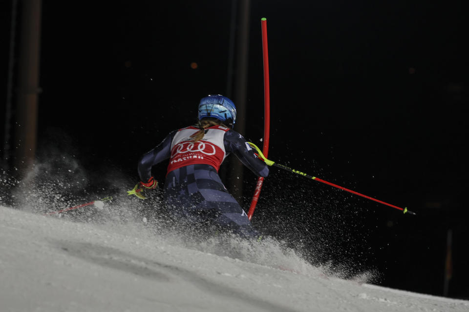 United States' Mikaela Shiffrin speeds down the course during an alpine ski, women's World Cup slalom in Flachau, Austria, Tuesday, Jan.10, 2023. (AP Photo/Marco Trovati)