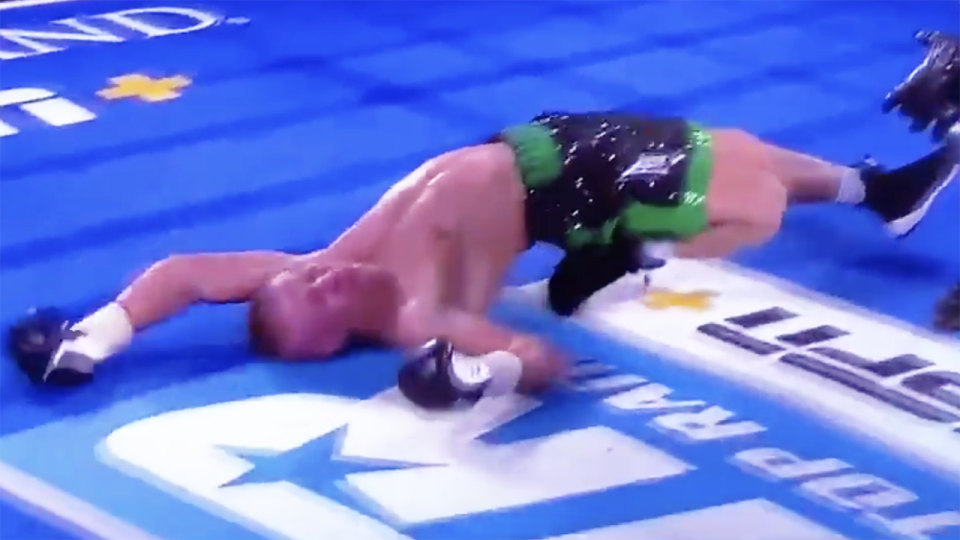 Boxer Ivan Baranchyk is pictured lying in the canvas after being knocked out by Jose Zepeda.