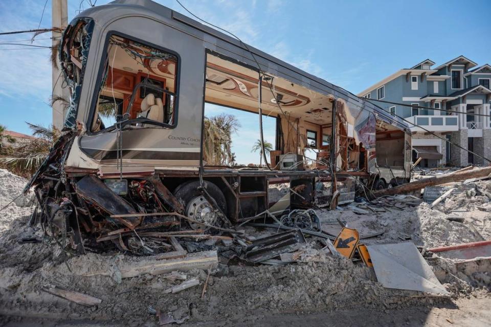 A mobile home damaged by Hurricane Ian is seen along the road on Fort Myers Beach on Monday, Oct. 3, 2022.