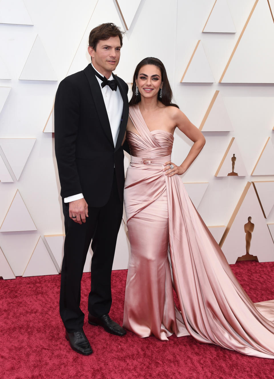 Mila Kunis and Ashton Kutcher at the 94th Academy Awards held at Dolby Theatre at the Hollywood & Highland Center on March 27th, 2022 in Los Angeles, California. (Photo by Gilbert Flores/Variety/Penske Media via Getty Images)