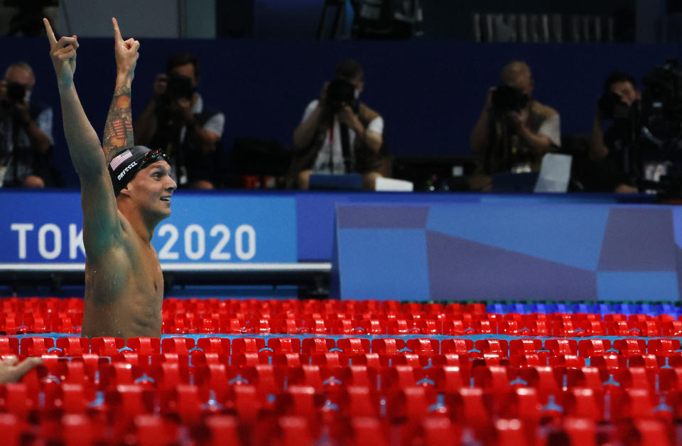 TOKYO, JAPAN - JULY 29: Caeleb Dressel of Team United States reacts after winning the gold medal in the Men's 100m Freestyle Final on day six of the Tokyo 2020 Olympic Games at Tokyo Aquatics Centre on July 29, 2021 in Tokyo, Japan. (Photo by Tom Pennington/Getty Images)