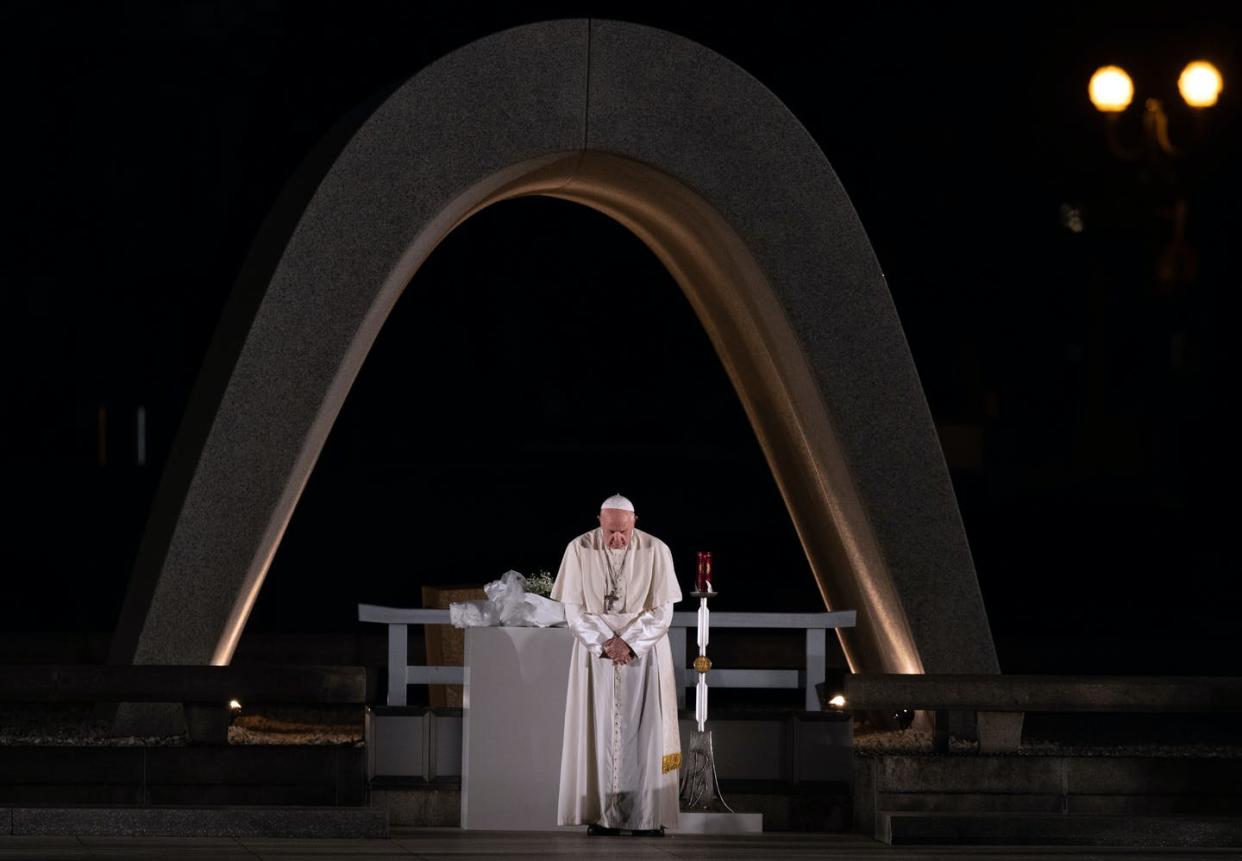 <span class="caption">Pope Francis observes a minute of silence for the victims of Hiroshima at the city's Peace Memorial Park.</span> <span class="attribution"><a class="link " href="https://www.gettyimages.com/detail/news-photo/pope-francis-stands-next-to-the-memorial-cenotaph-as-he-news-photo/1184309609?adppopup=true" rel="nofollow noopener" target="_blank" data-ylk="slk:Carl Court/Getty Images;elm:context_link;itc:0;sec:content-canvas">Carl Court/Getty Images</a></span>