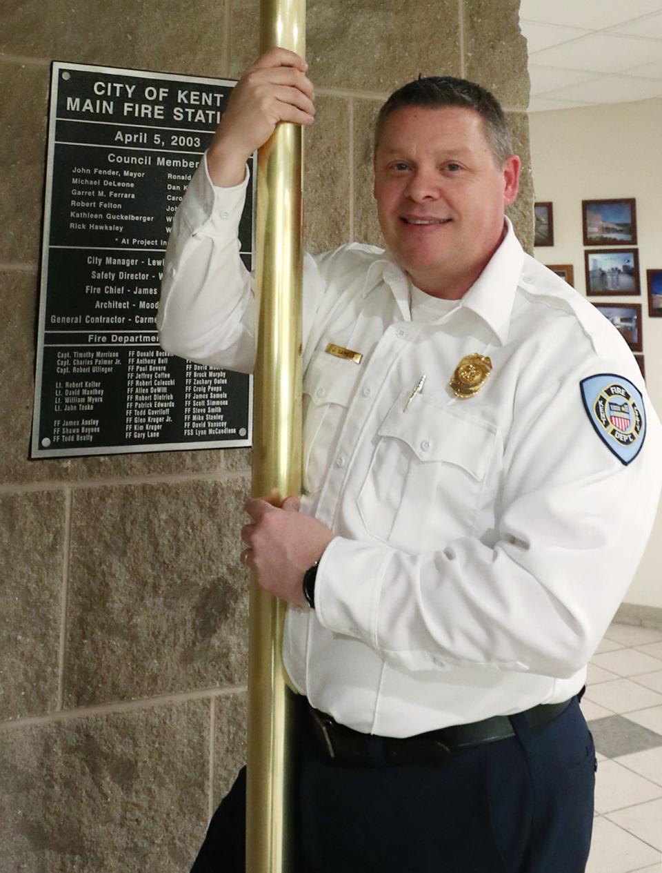 New Kent Fire Chief James Samels shows off the functional fireman pole during a tour of Station 1 in Kent on Tuesday, Feb. 27, 2024.