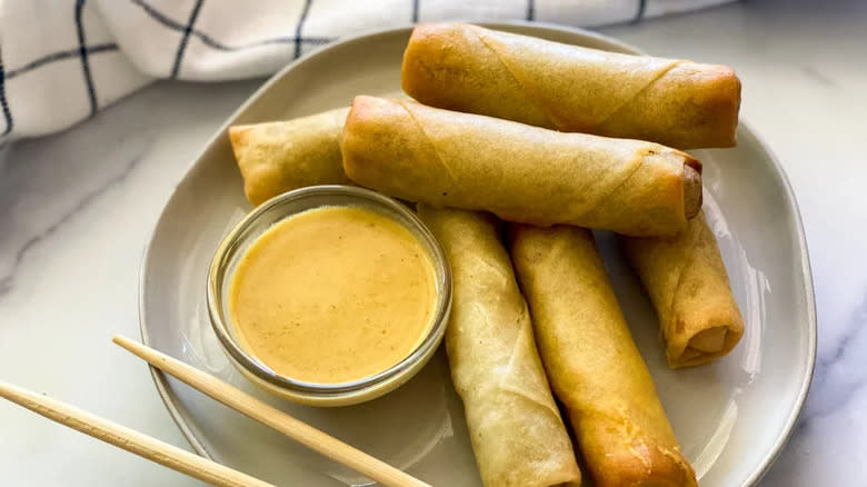 Mustard dipping sauce with spring rolls
