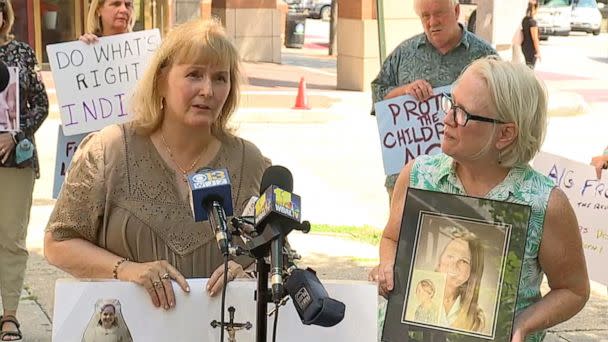 PHOTO: Teresa Lancaster and Jean Wehner speak at a rally outside Maryland Attorney General Brian Frosh's office in Baltimore on Aug. 2, 2022. (WMAR)