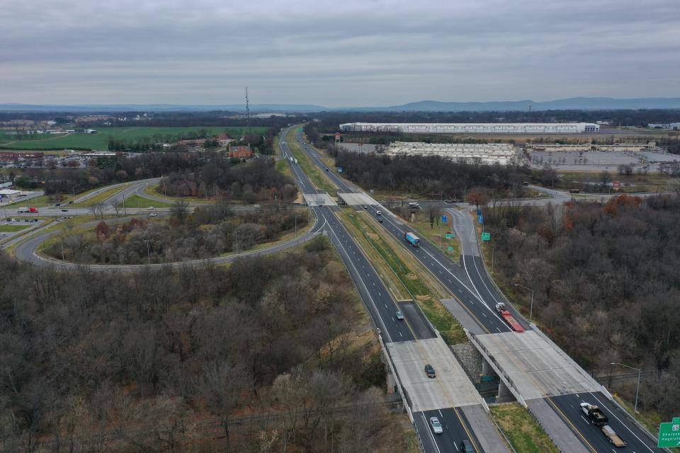The widening and rehabilitation of Interstate 70 bridges over Md. 65, also known as Sharpsburg Pike, and CSX railroad tracks (foreground) has been completed, the Maryland State Highway Administration announced Feb. 15, 2024. Seen in the back on the right is a new warehouse along Oak Ridge Drive.